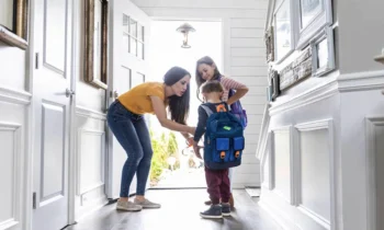 mom helping her kids get off to school